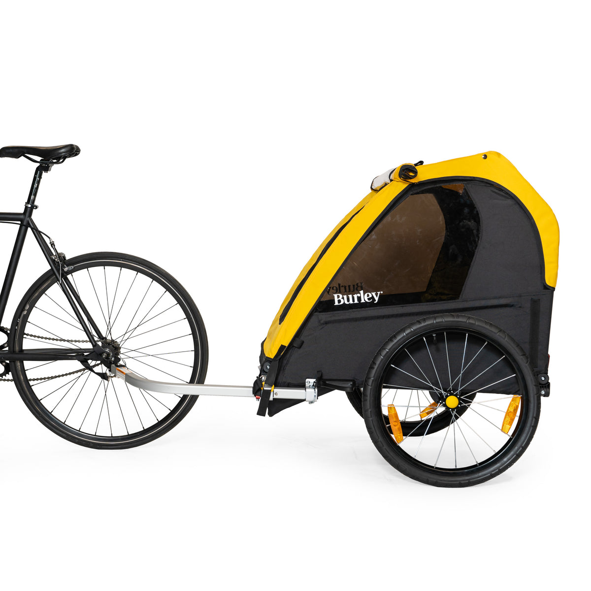 Burley Bee Double Kid Bike Trailer attached to a bike
