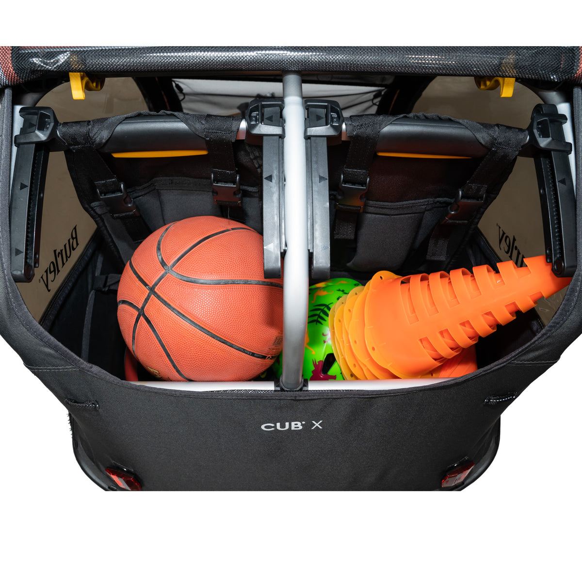 Burley Cub X Cargo Area filled with sports equipment
