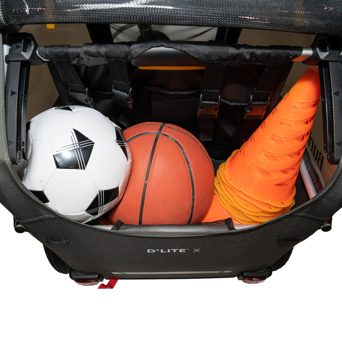 Burley D'Lite X Single Cargo Area filled with sports equipment