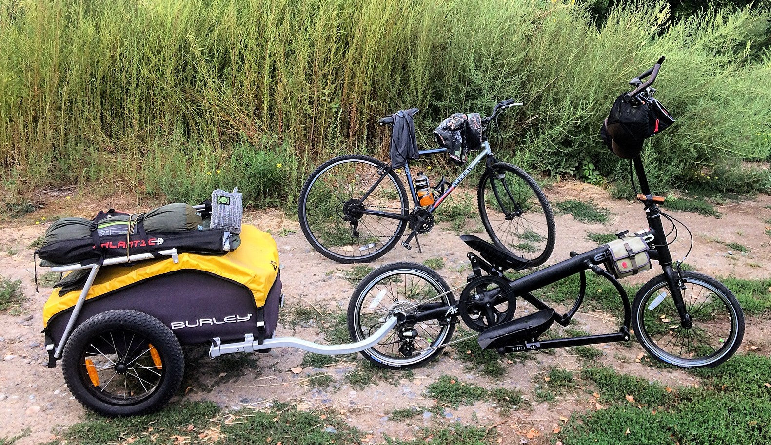 bikes and cargo trailers loaded with bikepacking gear