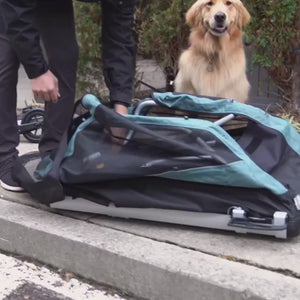 Video of Bark Ranger pet bike trailer being unfolded and set up then biked with a dog.