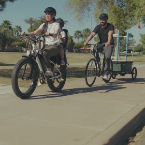 Video of Hopper Bike Trailer Wagon converting from cycling to strolling with child and seat insert at farmers market and loading groceries